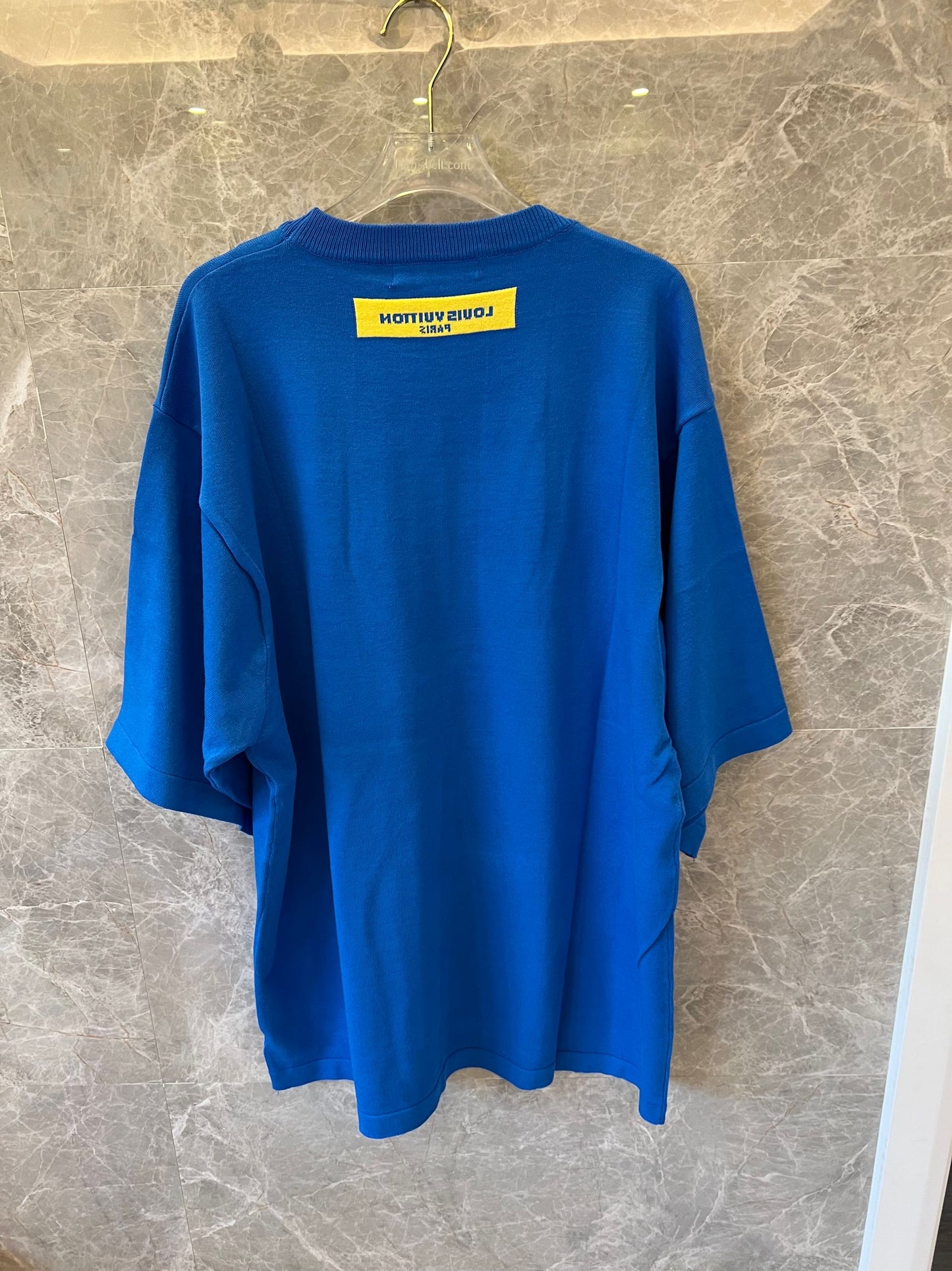 Louis Vuitton blue t-shirt with "Louis vuitton!" front logo and yellow Paris tag