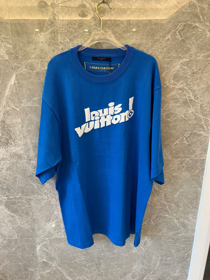 Louis Vuitton blue t-shirt with "Louis vuitton!" front logo and yellow Paris tag