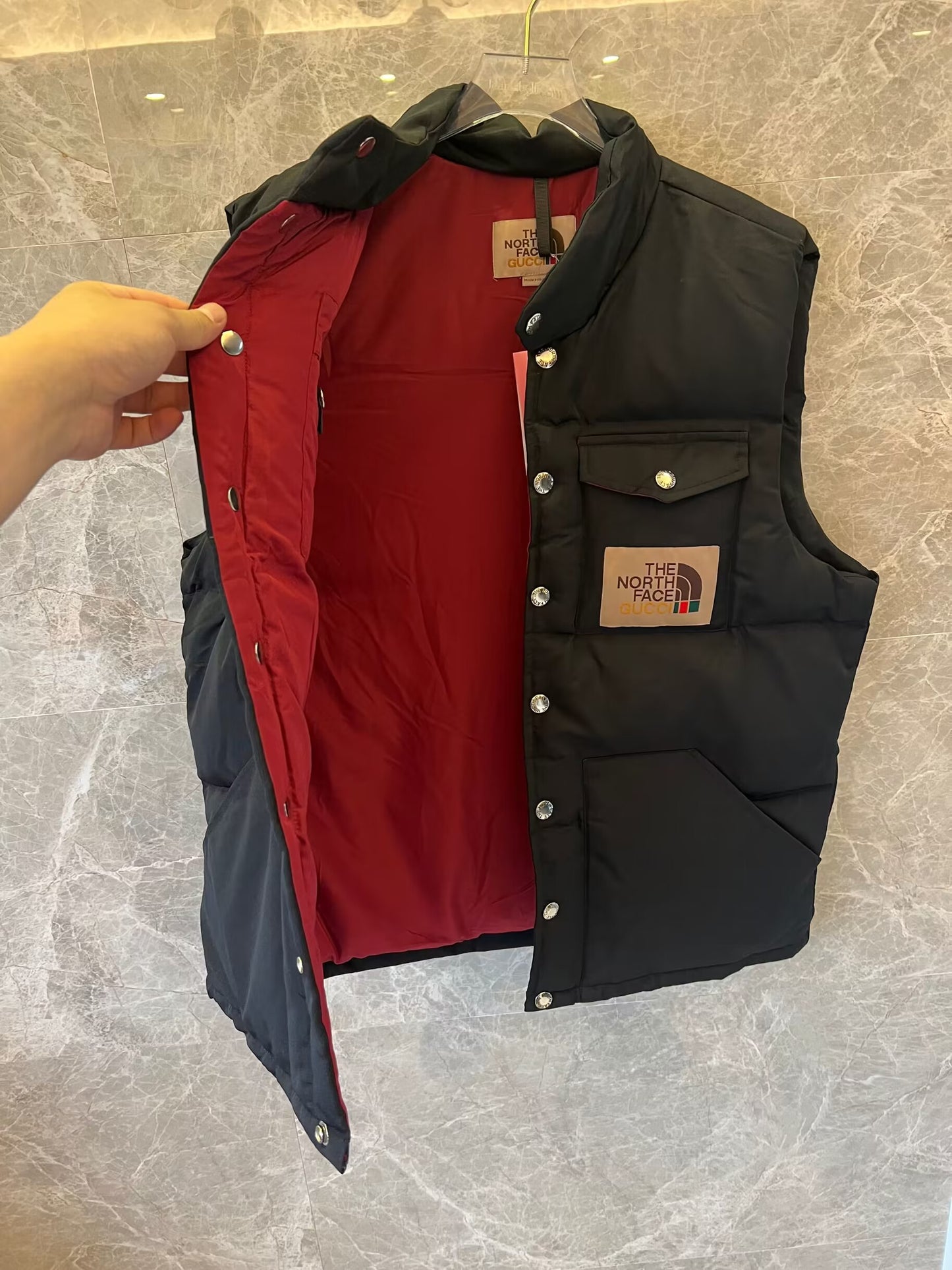 The North Face x Gucci black puffer vest