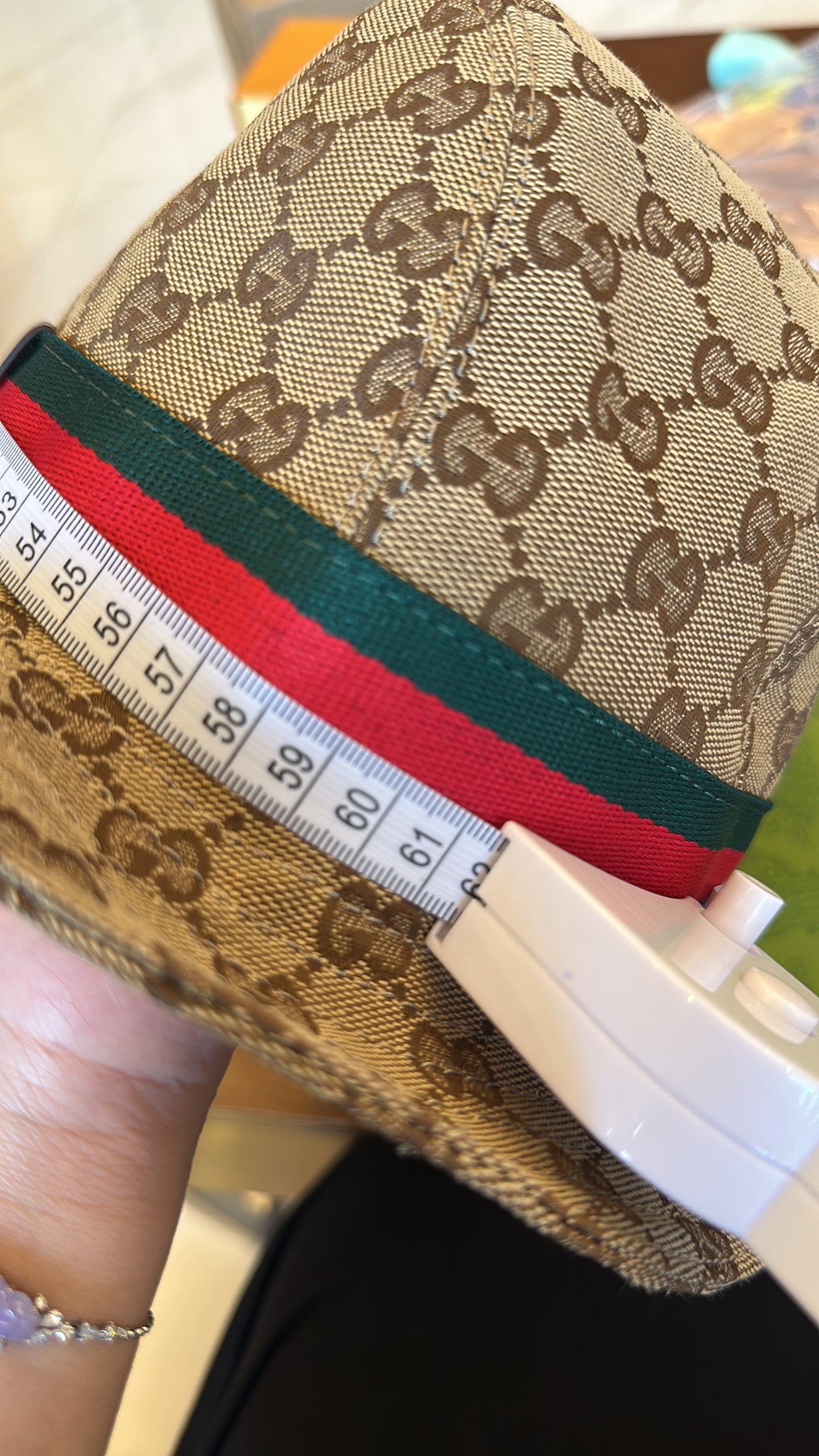 Gucci GG Supreme bucket hat with signature web stripe