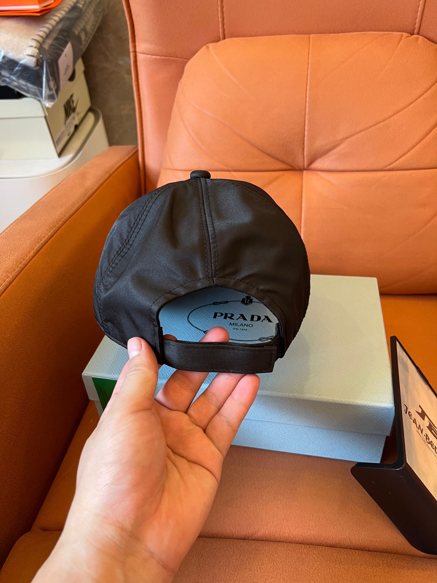 Prada black nylon baseball cap with iconic metal logo