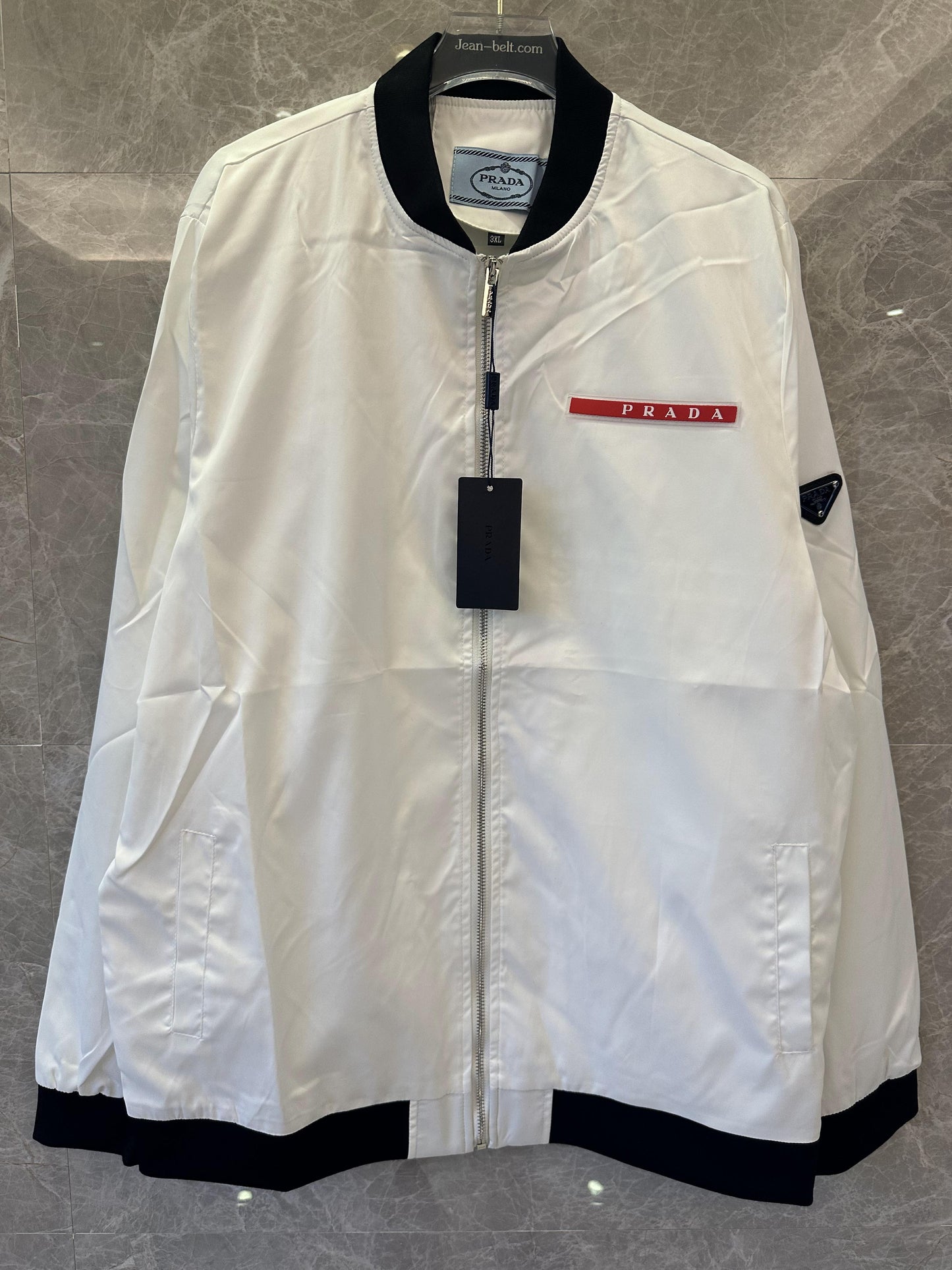 Prada white technical fabric bomber jacket with signature logo detailing