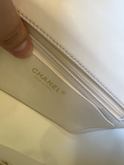 Chanel white quilted lambskin top handle mini flap bag