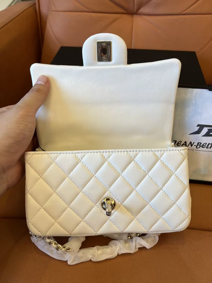 Chanel white quilted lambskin top handle mini flap bag