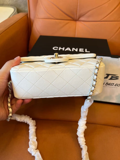 Chanel white quilted lambskin top handle mini flap bag