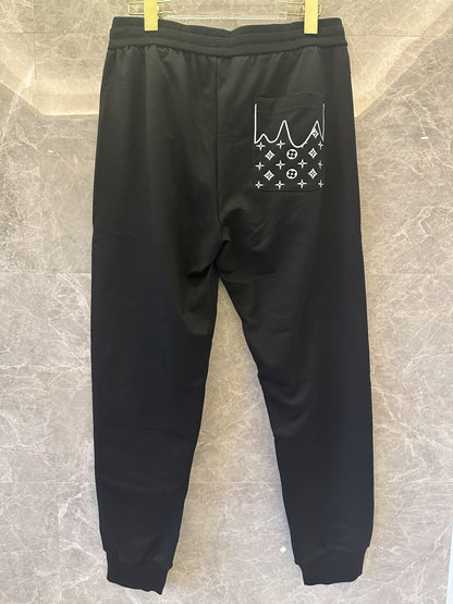 Louis Vuitton art-inspired jogger pants with iconic monogram detail