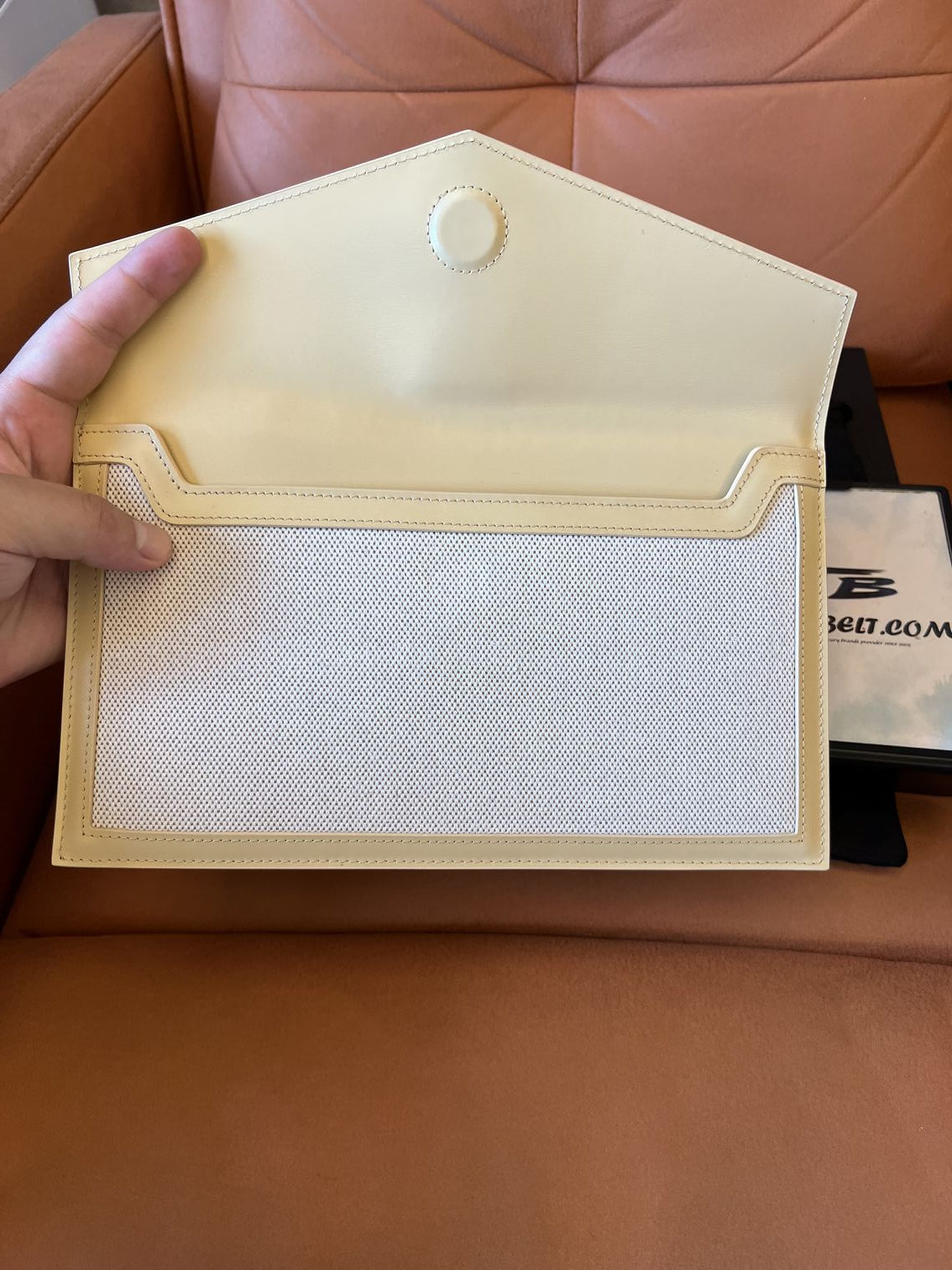 Saint Laurent beige uptown leather clutch bag