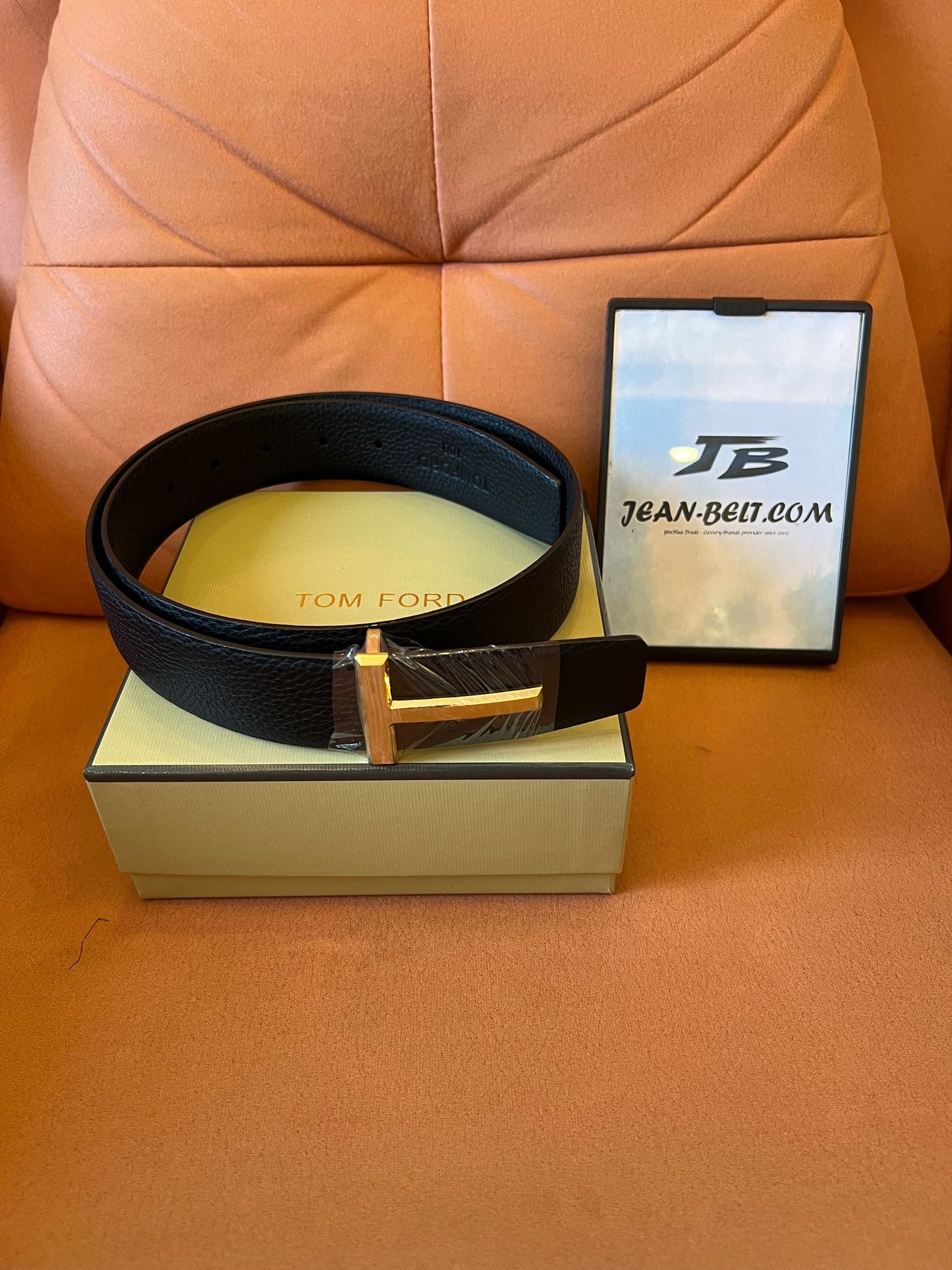 Tom Ford black leather belt with gold T buckle