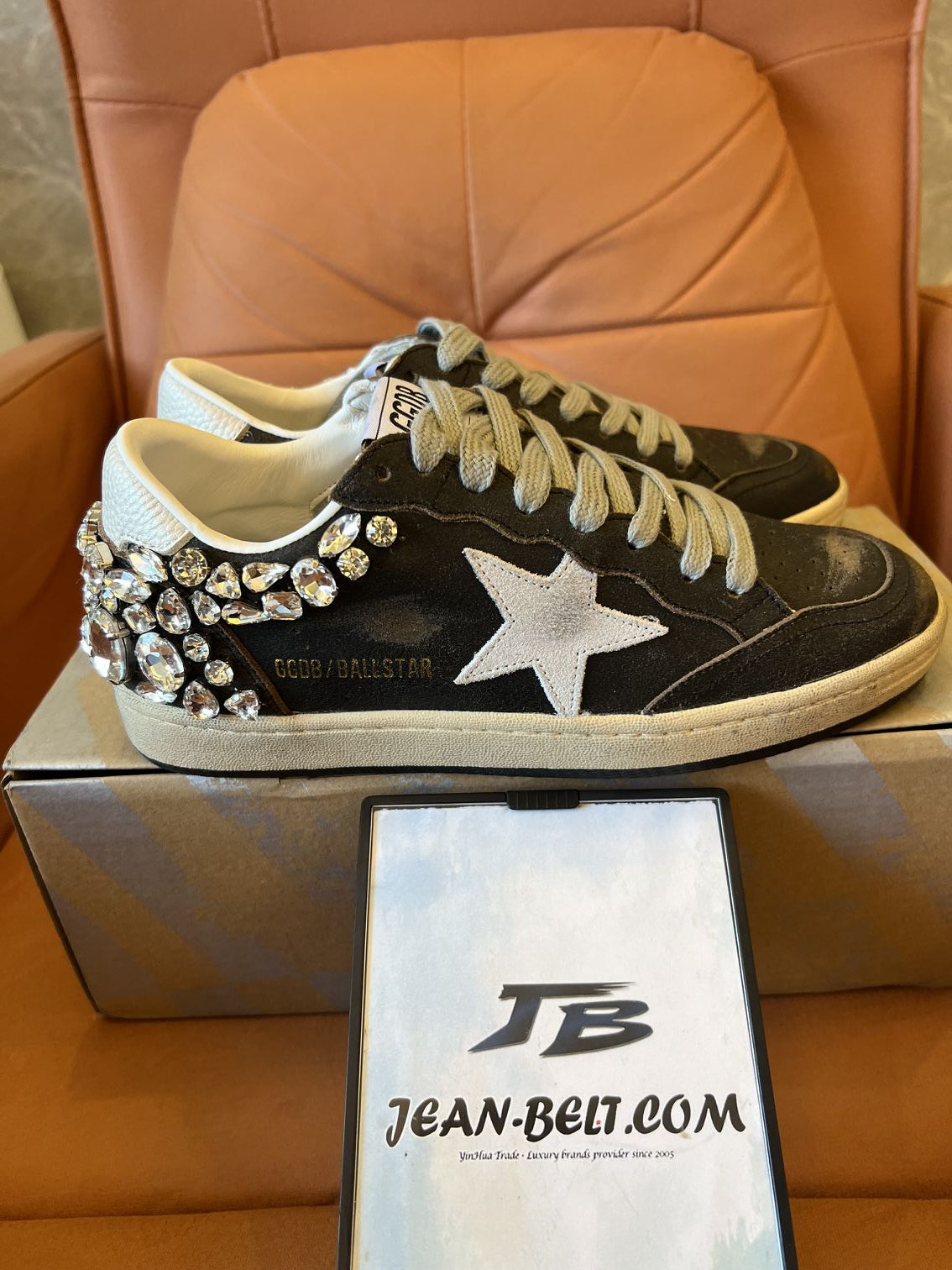 Golden Goose Ball Star in black leather with crystal decoration