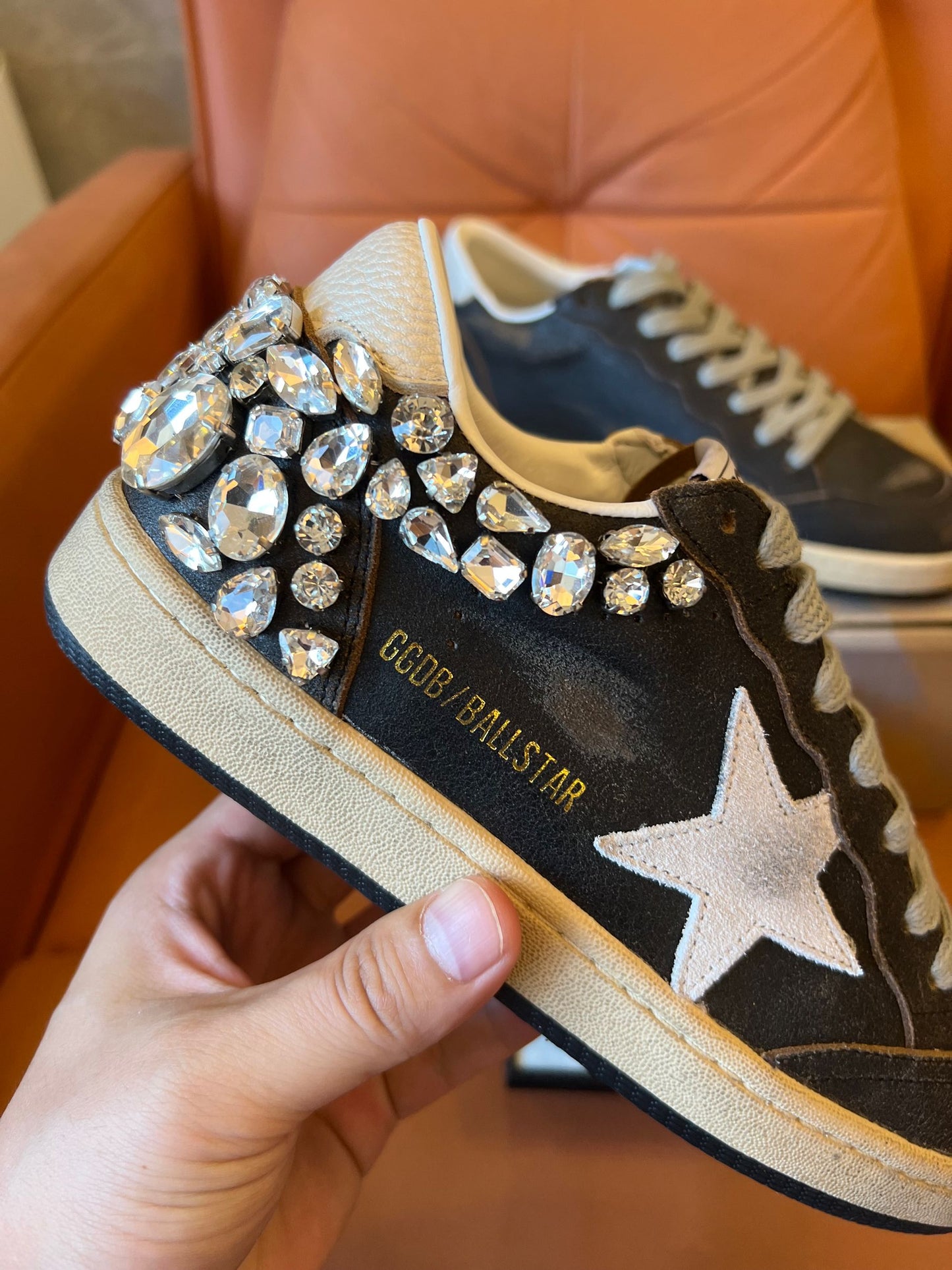 Golden Goose Ball Star in black leather with crystal decoration