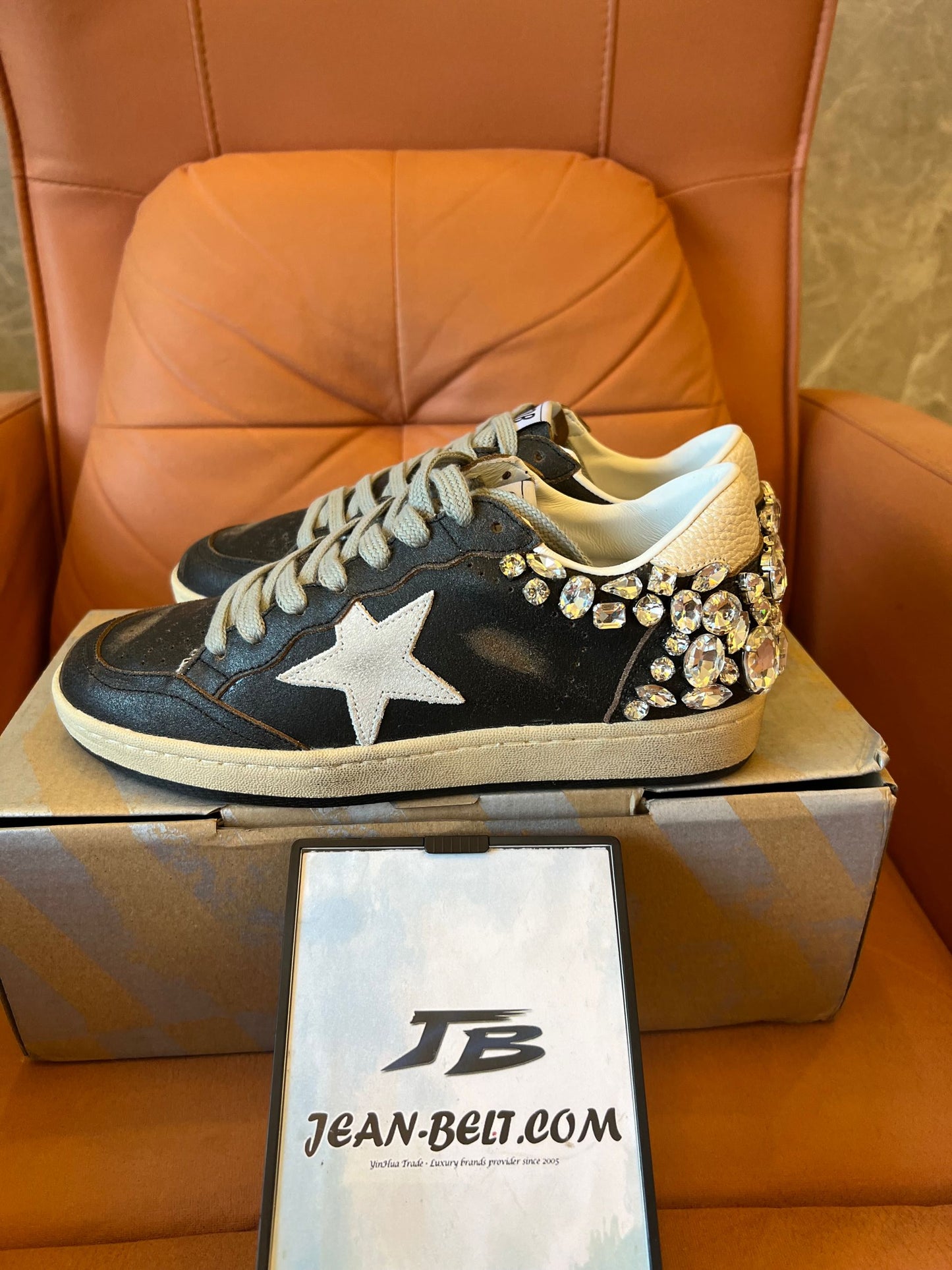 Golden Goose Ball Star in black leather with crystal decoration