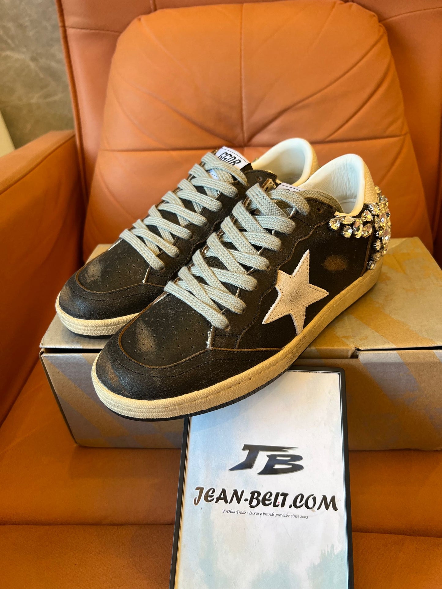 Golden Goose Ball Star in black leather with crystal decoration