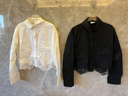 Burberry elegant cropped lace hem shirt in black and white