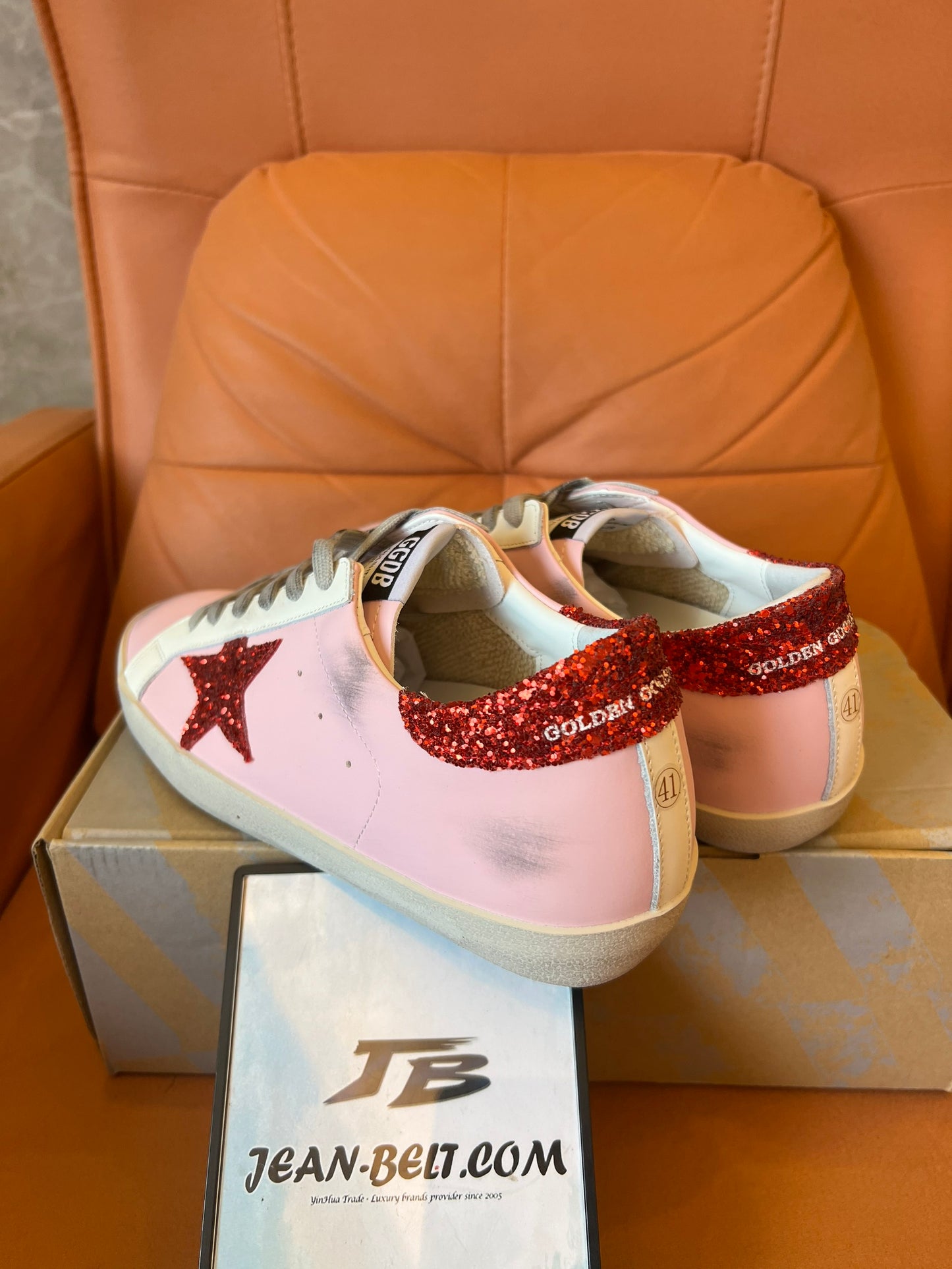 Golden Goose pink and red star sneakers