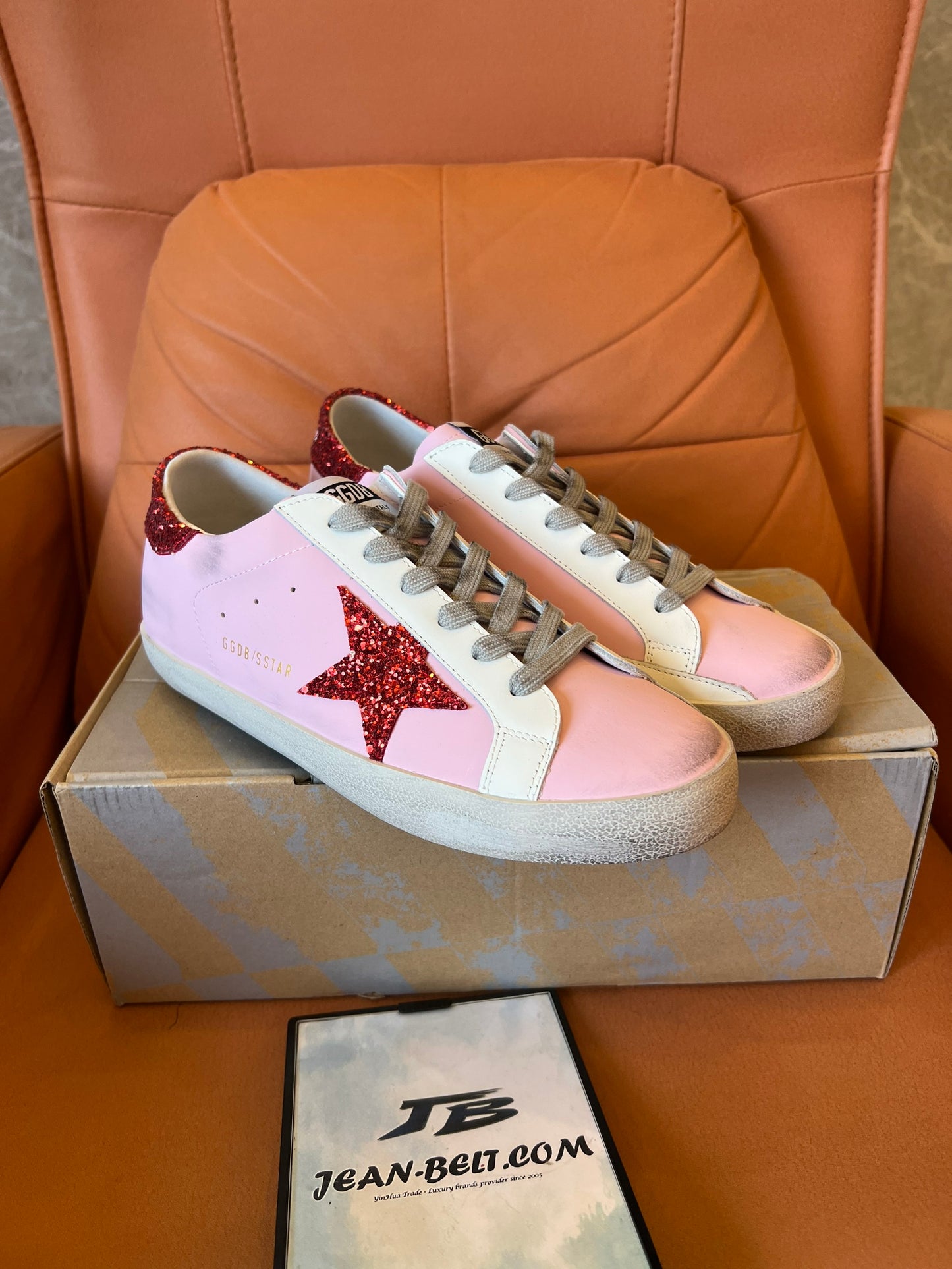 Golden Goose pink and red star sneakers