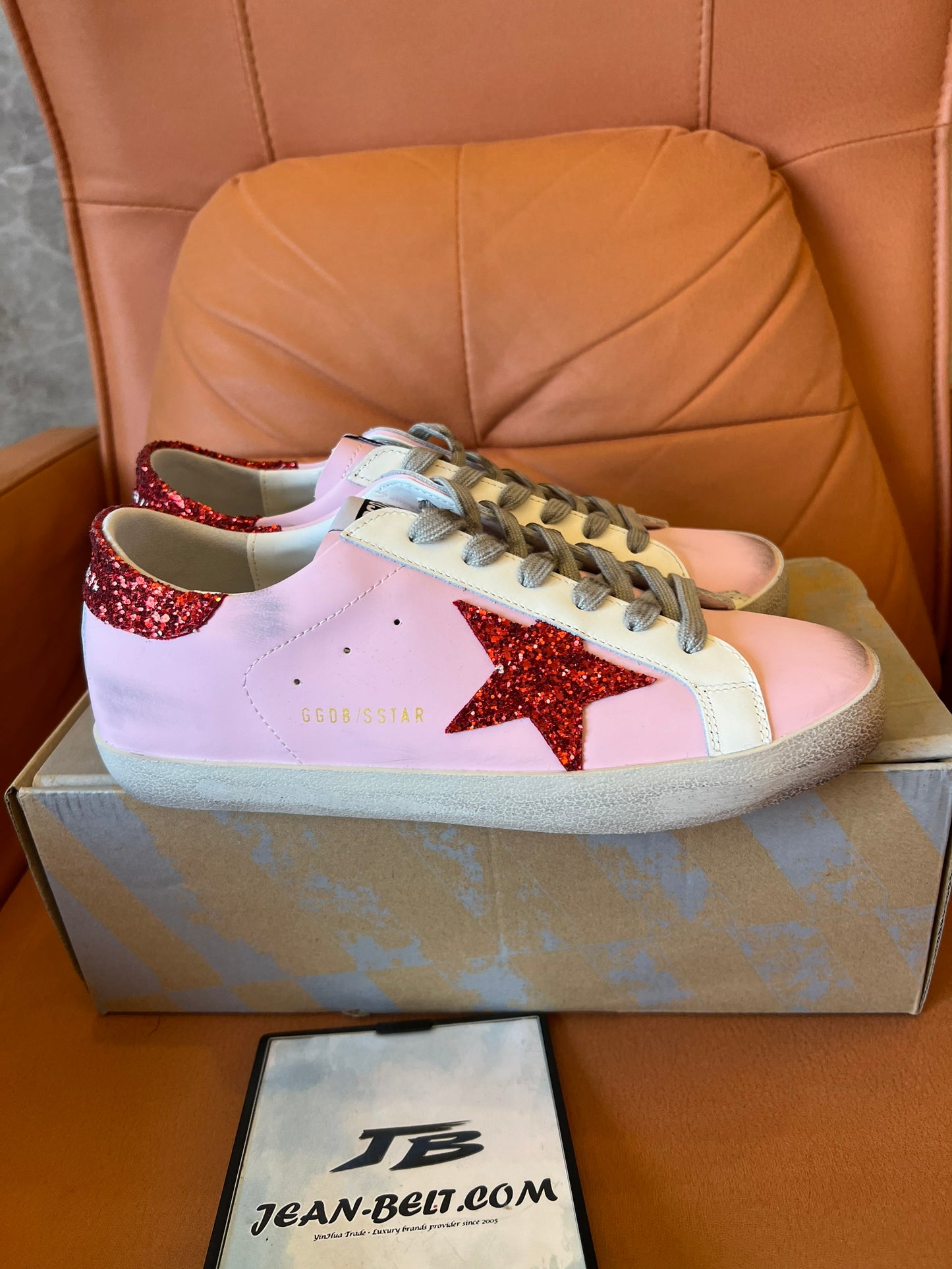 Golden Goose pink and red star sneakers