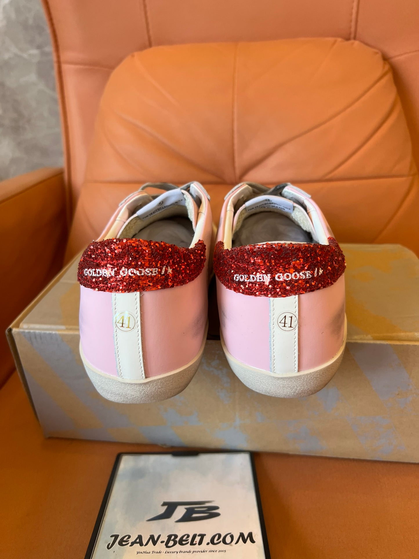 Golden Goose pink and red star sneakers