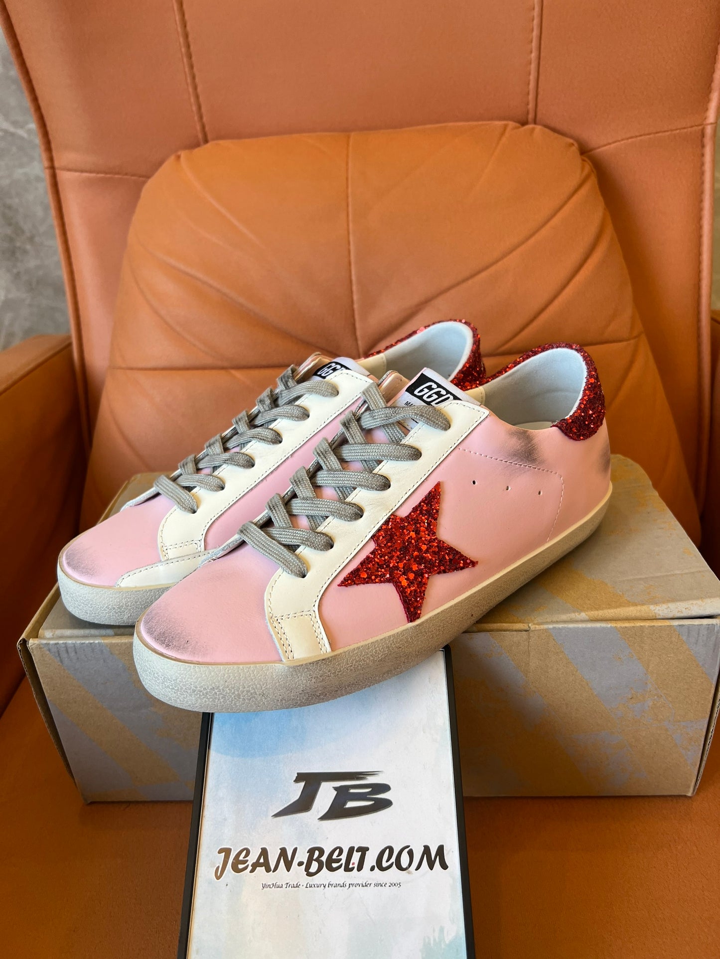 Golden Goose pink and red star sneakers