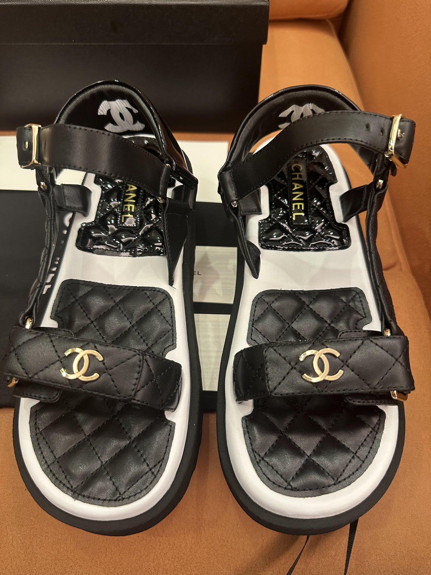 Chanel lambskin logo platform sandals black white