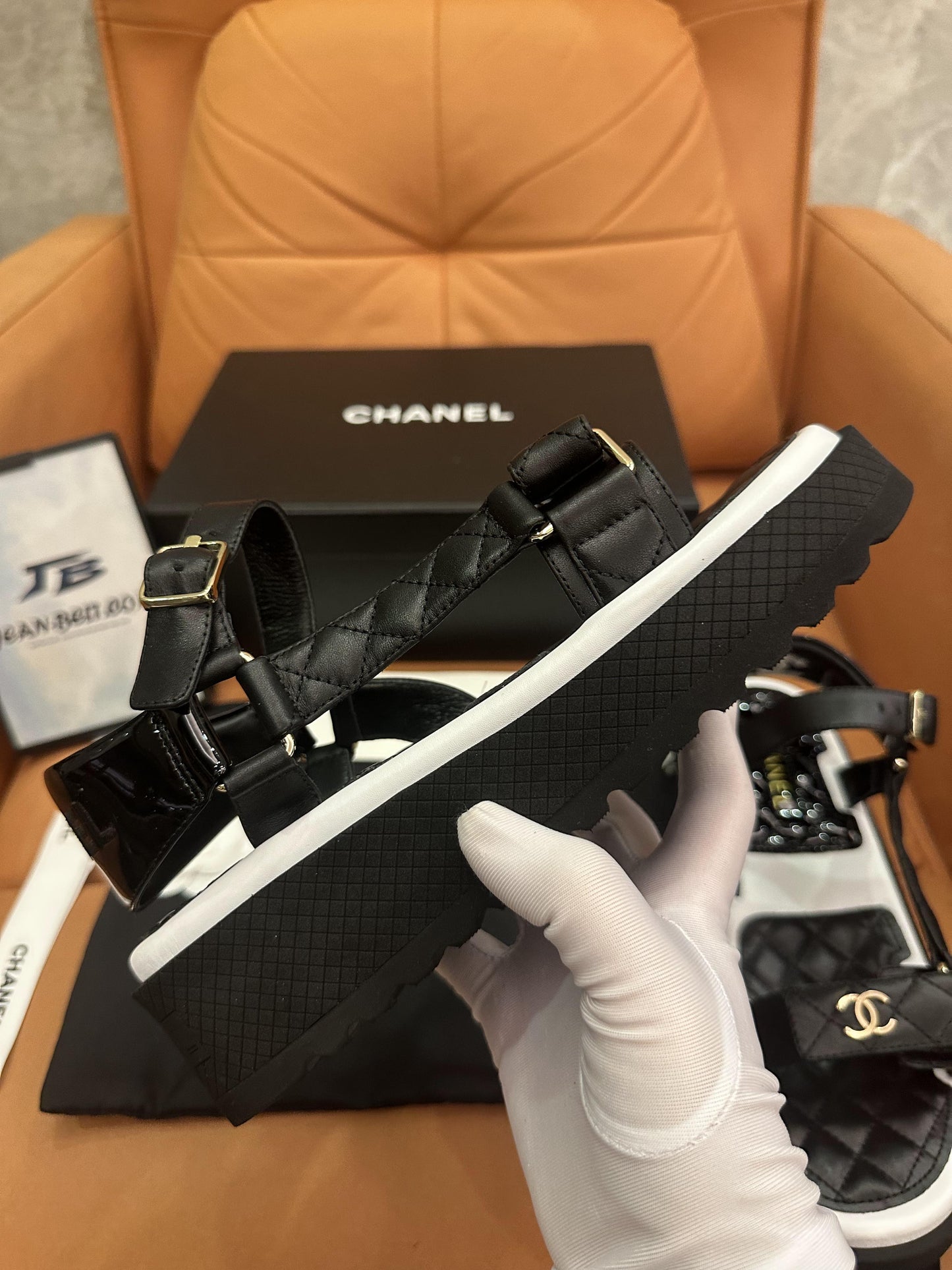 Chanel lambskin logo platform sandals black white