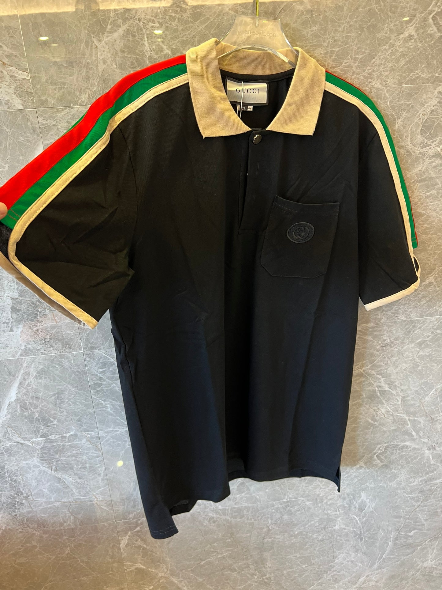 Gucci black polo shirt with iconic web stripes