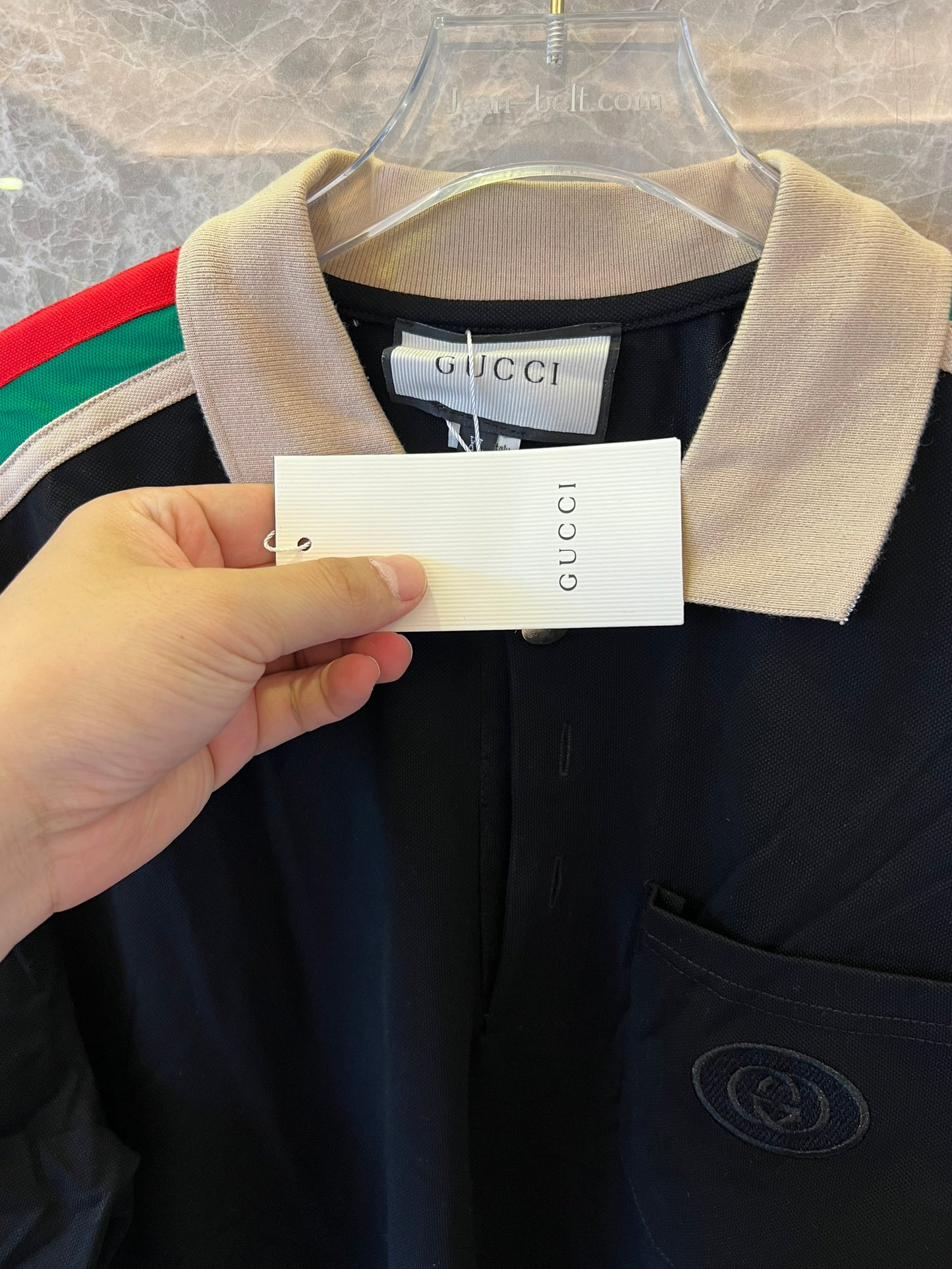 Gucci black polo shirt with iconic web stripes