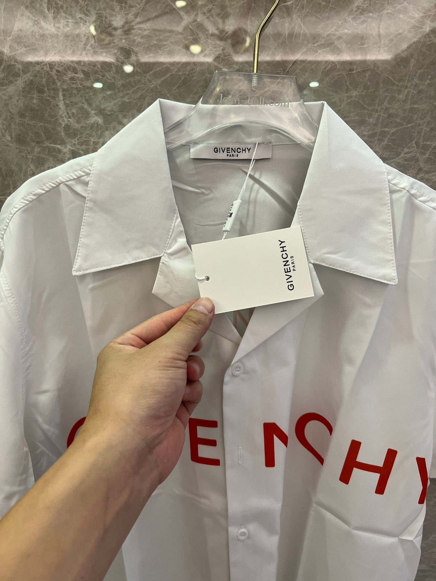 Givenchy white short-sleeve button-up shirt with bold red logo print