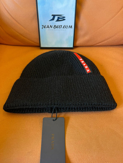 Prada black knitted wool beanie with signature red stripe logo