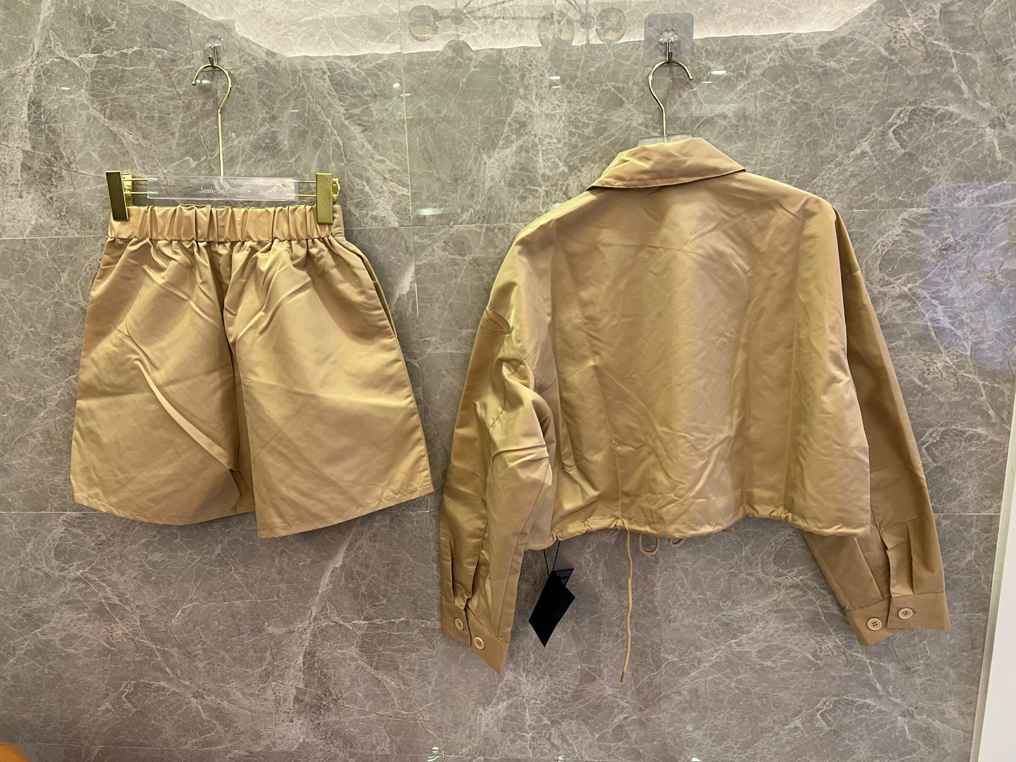 rada beige nylon crop jacket and high-waisted shorts set