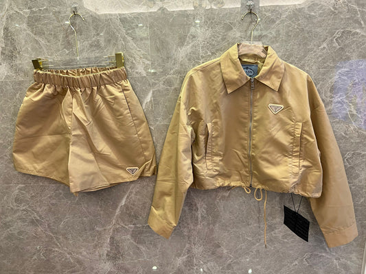 rada beige nylon crop jacket and high-waisted shorts set