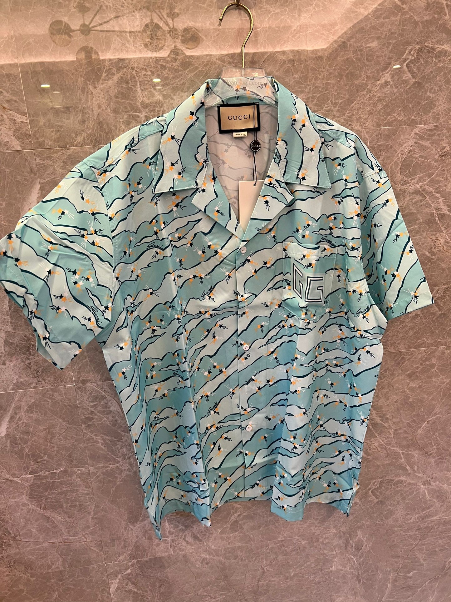 Gucci floral print blue short-sleeve button-up shirt