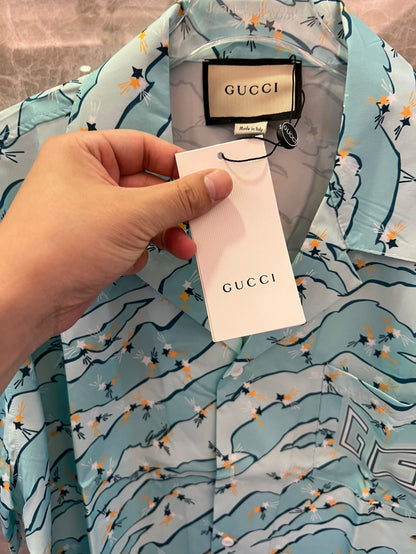 Gucci floral print blue short-sleeve button-up shirt