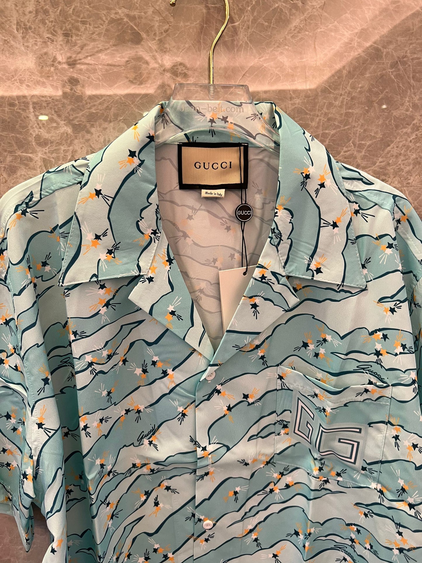 Gucci floral print blue short-sleeve button-up shirt