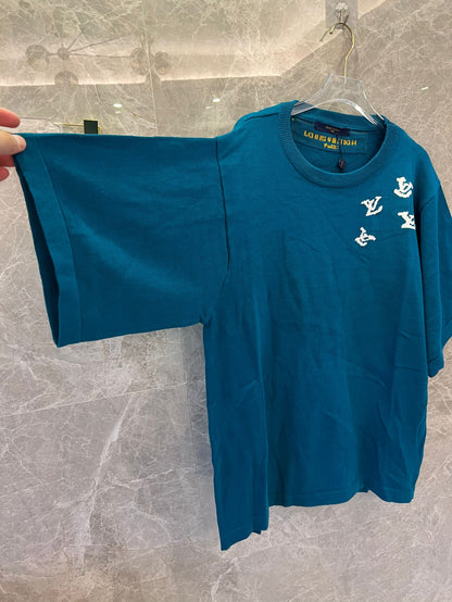 Louis Vuitton teal knit t-shirt with trumpeter motif and LV logos