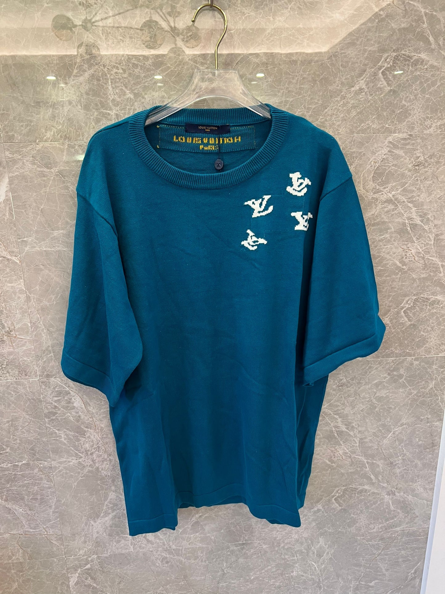 Louis Vuitton teal knit t-shirt with trumpeter motif and LV logos