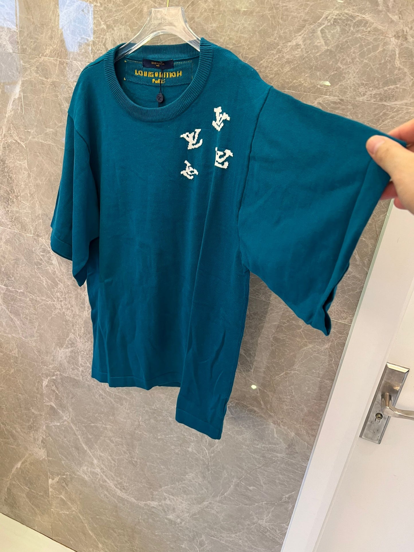 Louis Vuitton teal knit t-shirt with trumpeter motif and LV logos