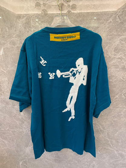 Louis Vuitton teal knit t-shirt with trumpeter motif and LV logos