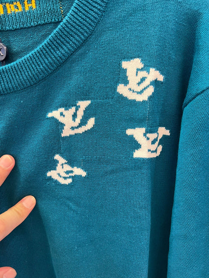 Louis Vuitton teal knit t-shirt with trumpeter motif and LV logos