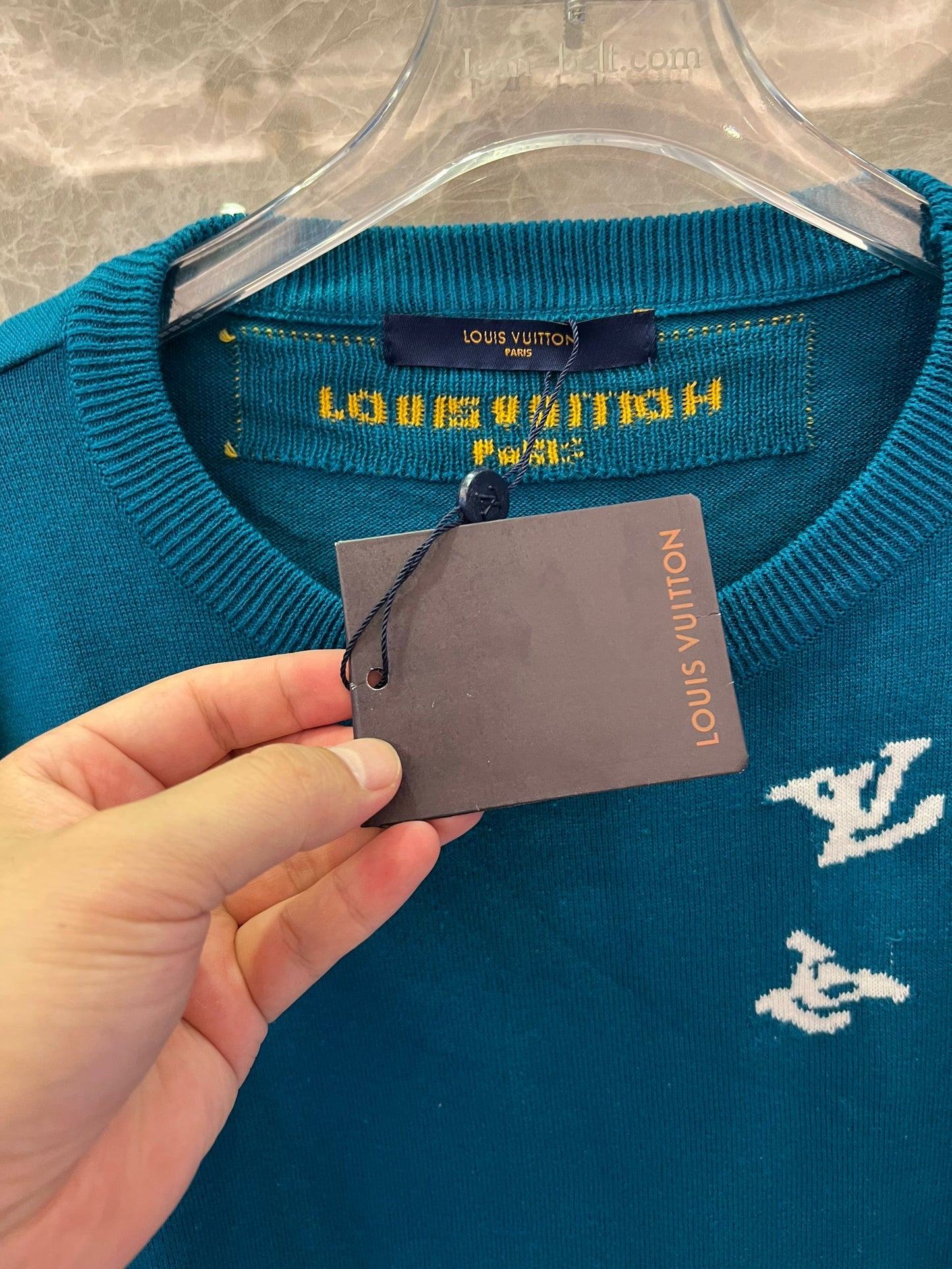 Louis Vuitton teal knit t-shirt with trumpeter motif and LV logos