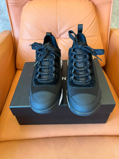 Chanel low top black trainer