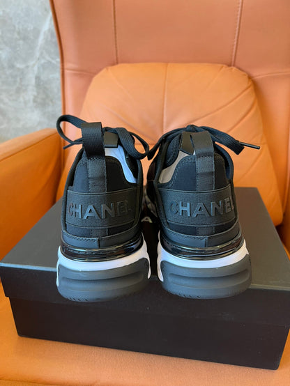 Chanel low top black trainer