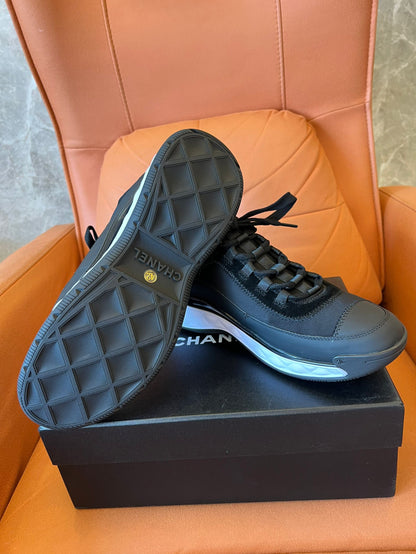 Chanel low top black trainer