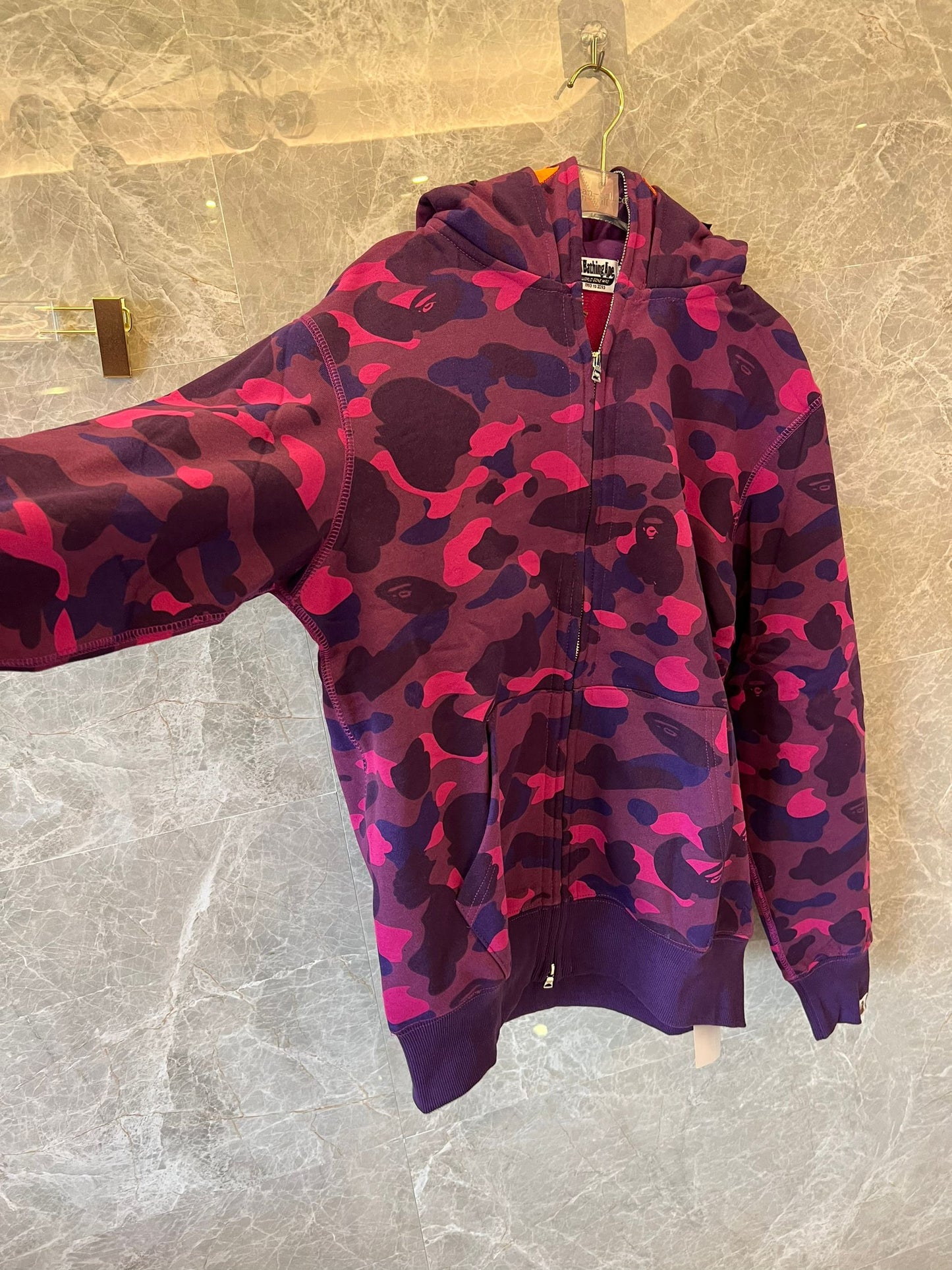 A Bathing Ape camo full-zip shark hoodie in purple and pink