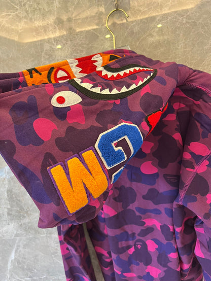 A Bathing Ape camo full-zip shark hoodie in purple and pink