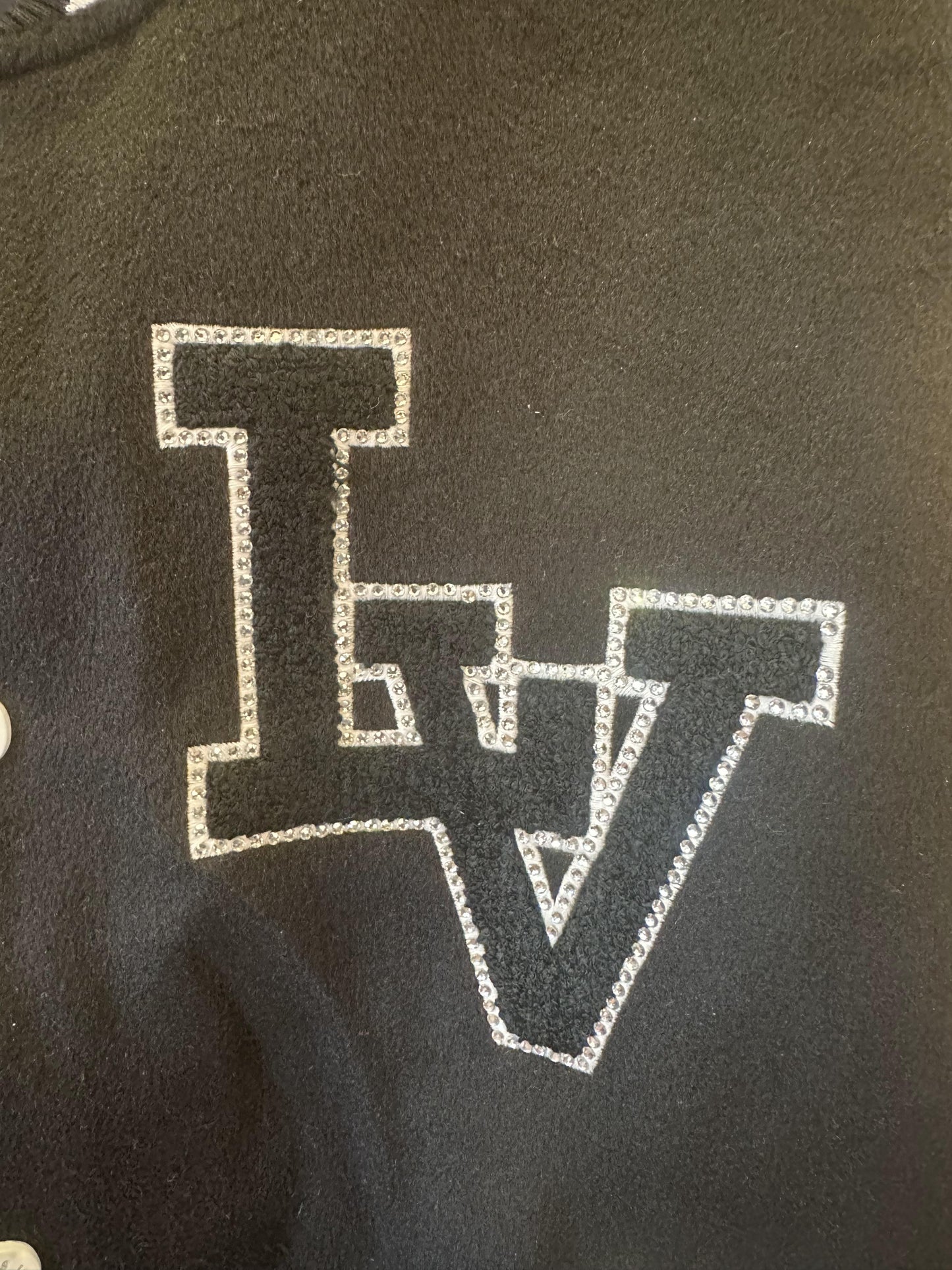 Louis Vuitton varsity bomber jacket with monogram and embroidered branding