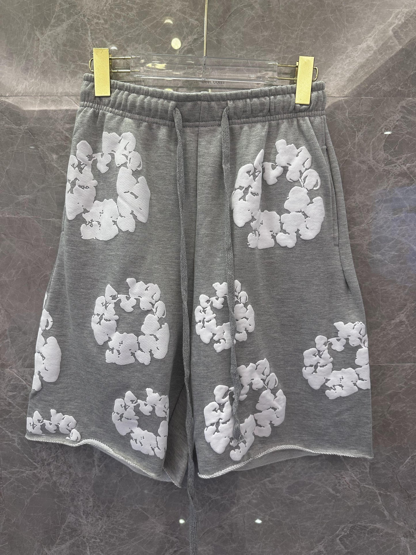 Four Cactus grey shorts with white floral print