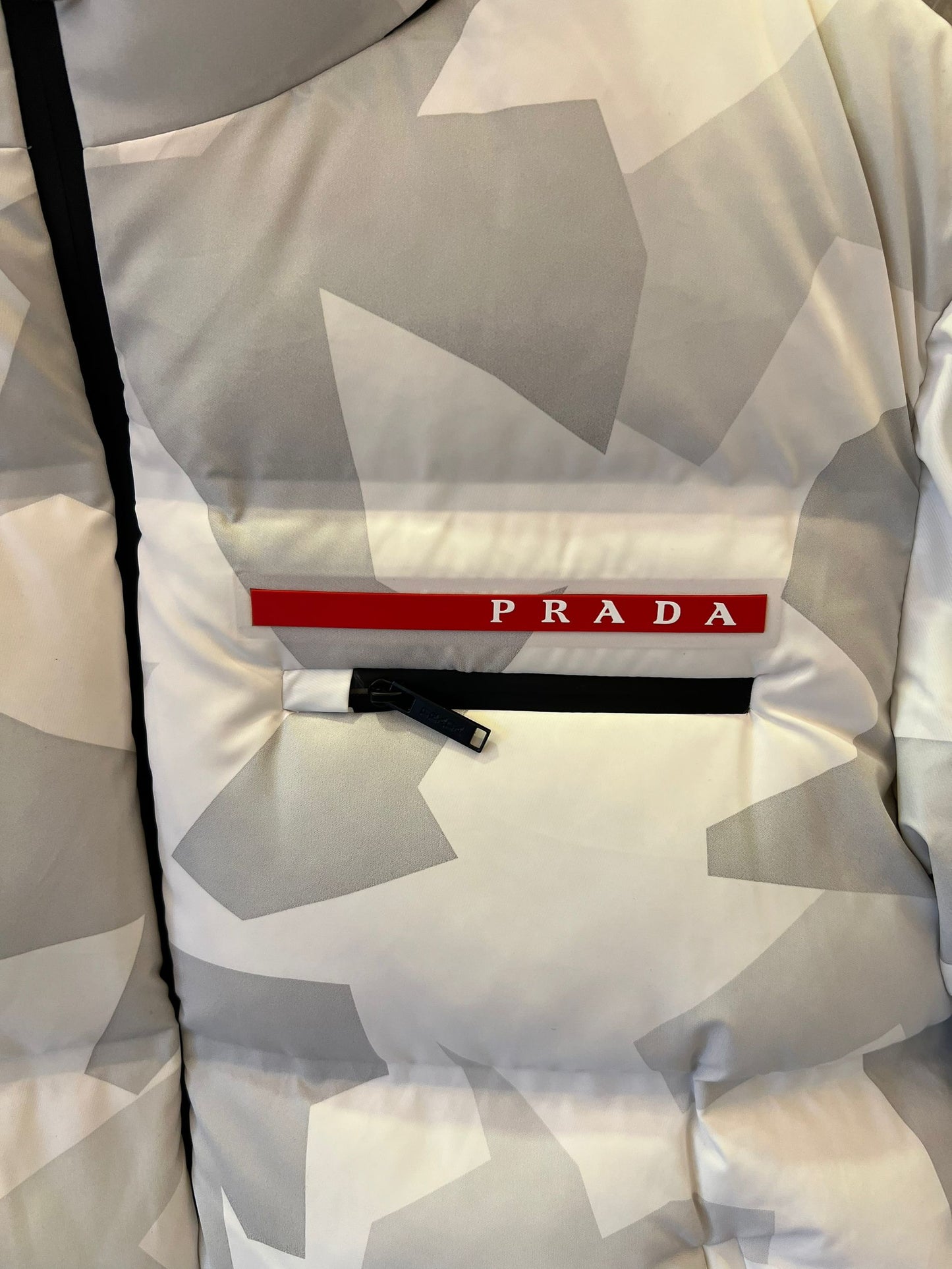 Prada white and gray camouflage puffer jacket with logo pocket