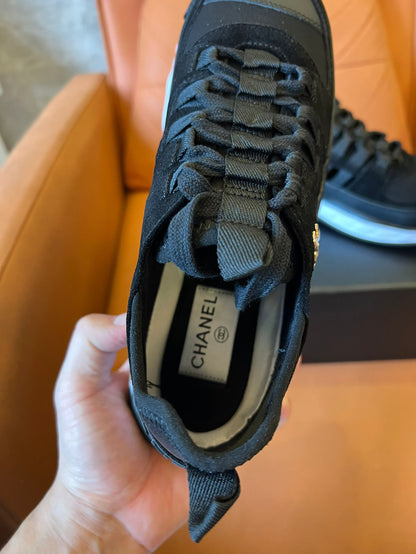 Chanel quilted sole black sneakers