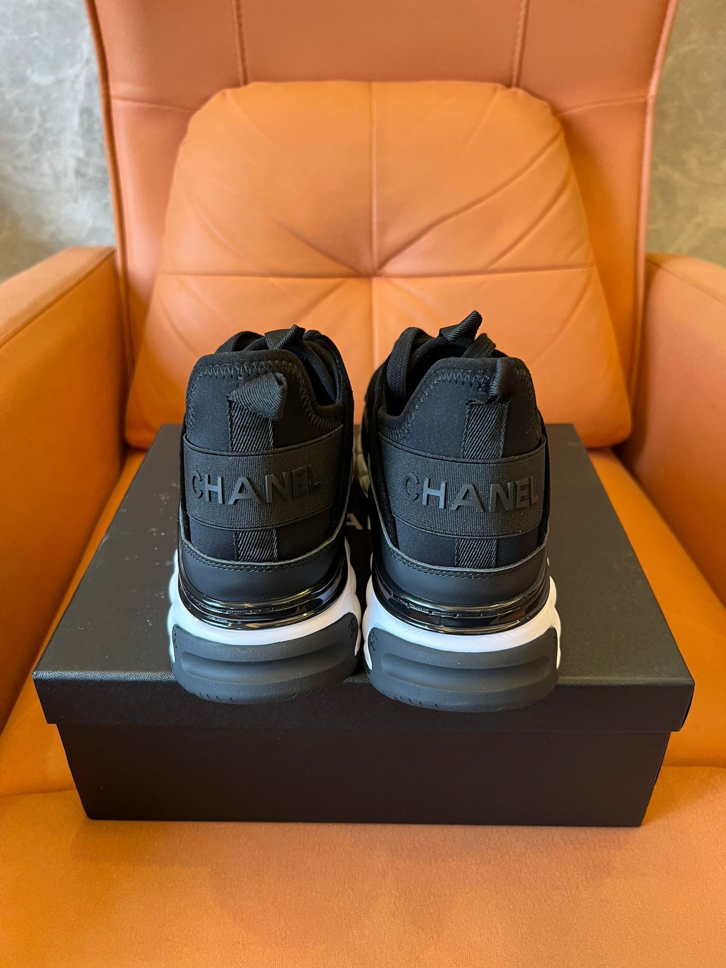 Chanel quilted sole black sneakers