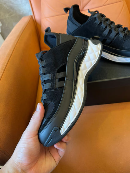 Chanel quilted sole black sneakers